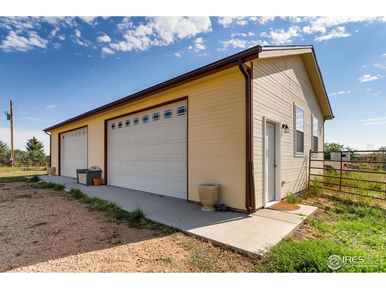 11840 Wasatch Road Longmont, CO 80504 - Photo 27 of 38 a view of a house with a backyard