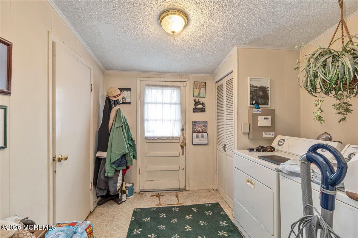 225 Freeman Street Woodbridge, NJ 07095 - Photo 13 of 39 a bedroom with a bed and a window