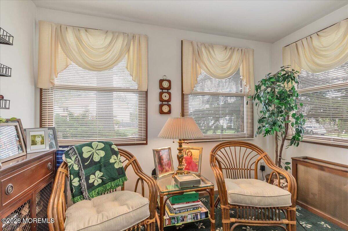 225 Freeman Street Woodbridge, NJ 07095 - Photo 5 of 39 a balcony with table and chairs