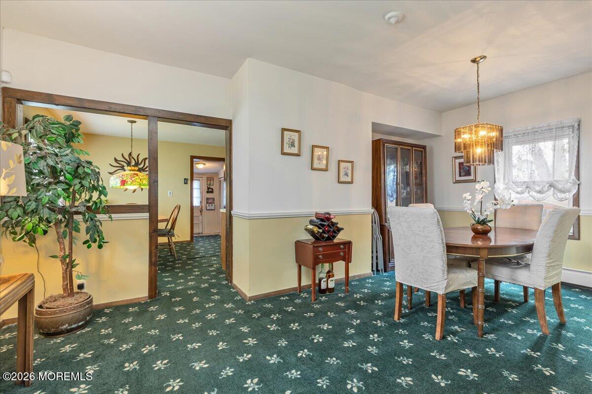 225 Freeman Street Woodbridge, NJ 07095 - Photo 6 of 39 a view of a dining room with furniture