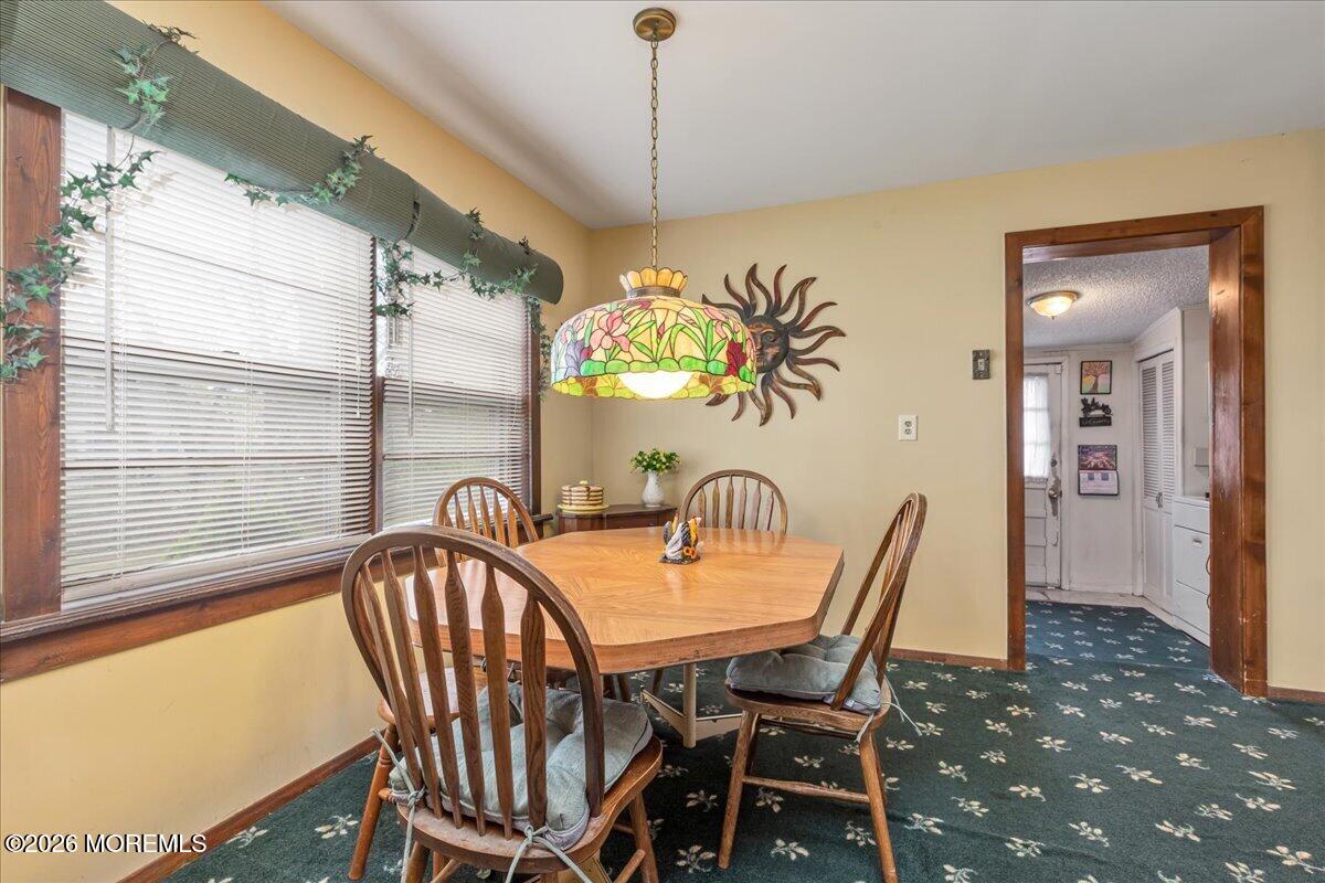 225 Freeman Street Woodbridge, NJ 07095 - Photo 9 of 39 a view of a dining room with furniture window and outside view