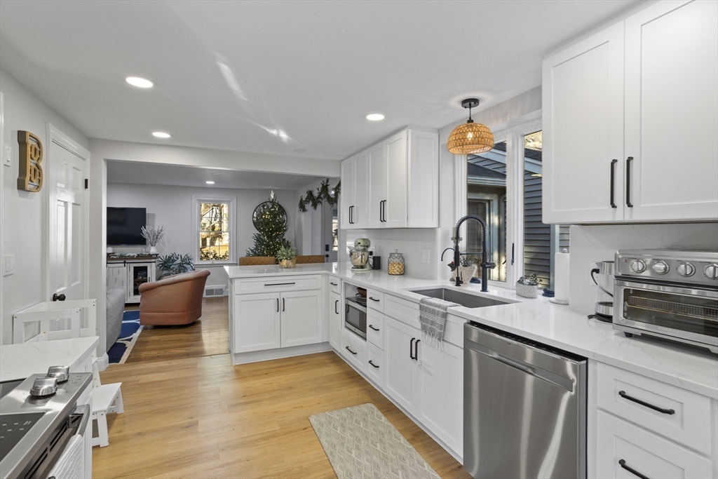 85 Red Acre Road Stow, MA 01775 - Photo 15 of 36 a kitchen with stainless steel appliances granite countertop a sink and cabinets