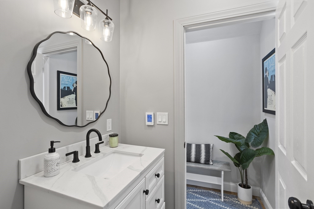 85 Red Acre Road Stow, MA 01775 - Photo 21 of 36 a bathroom with a sink and a mirror