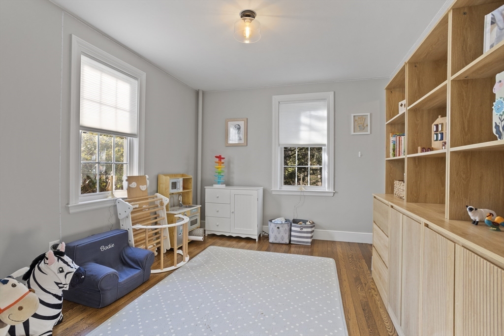 85 Red Acre Road Stow, MA 01775 - Photo 22 of 36 a bedroom with furniture and a window