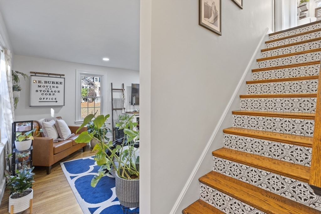 85 Red Acre Road Stow, MA 01775 - Photo 25 of 36 a living room with furniture and a potted plant