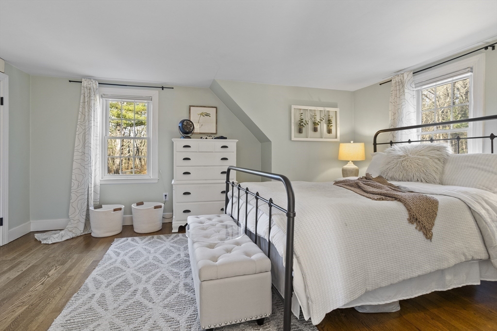 85 Red Acre Road Stow, MA 01775 - Photo 26 of 36 a bedroom with furniture and a window