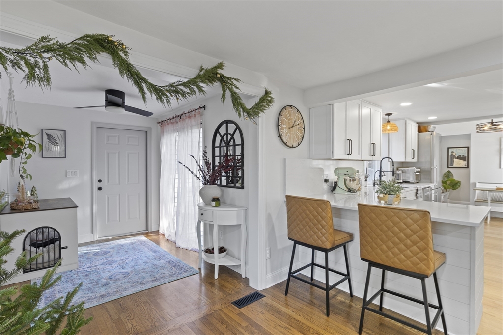 85 Red Acre Road Stow, MA 01775 - Photo 9 of 36 a living room with furniture and a wooden floor