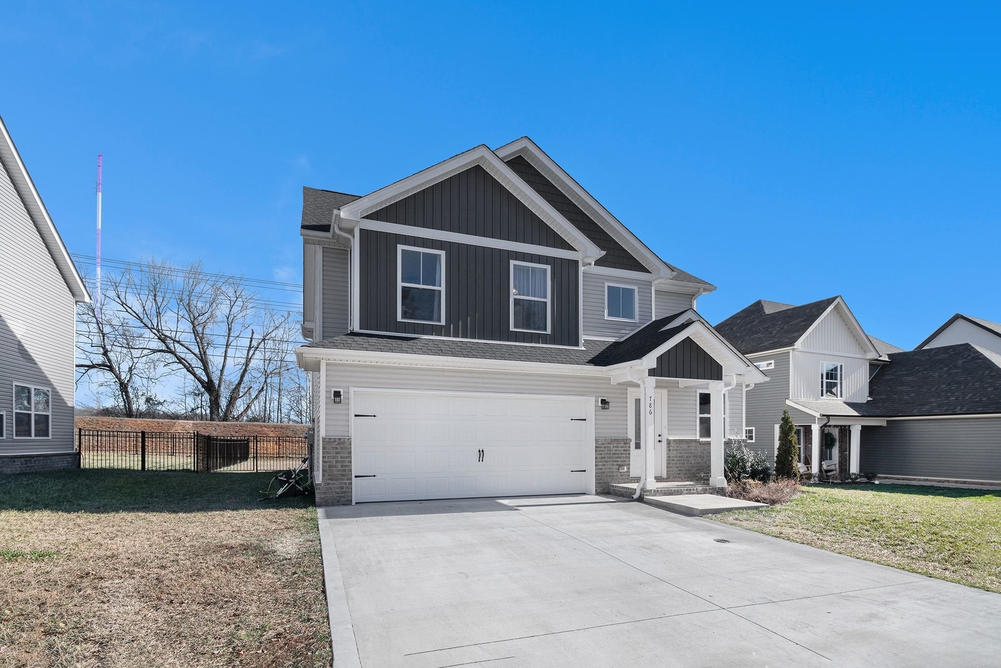 a front view of a house with a yard