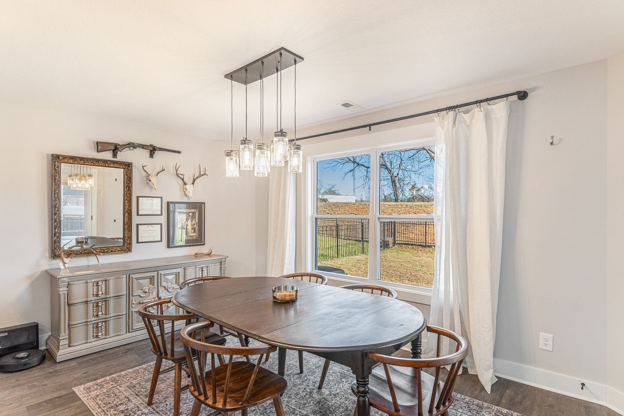 786 Limestone Way Clarksville, TN 37043 - Photo 11 of 29 a view of a dining room with furniture window and wooden floor
