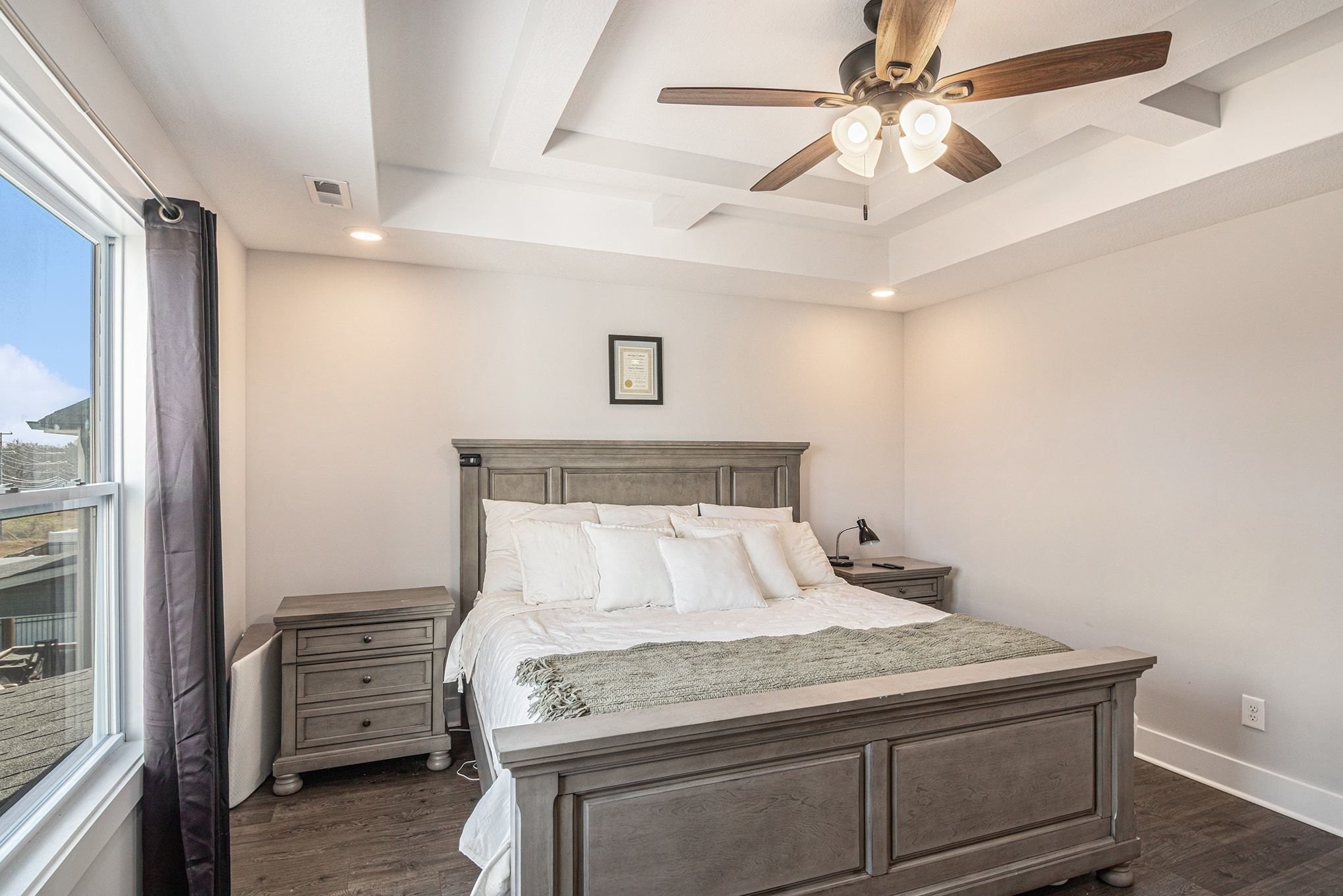 786 Limestone Way Clarksville, TN 37043 - Photo 16 of 29 a bedroom with a bed and a chandelier