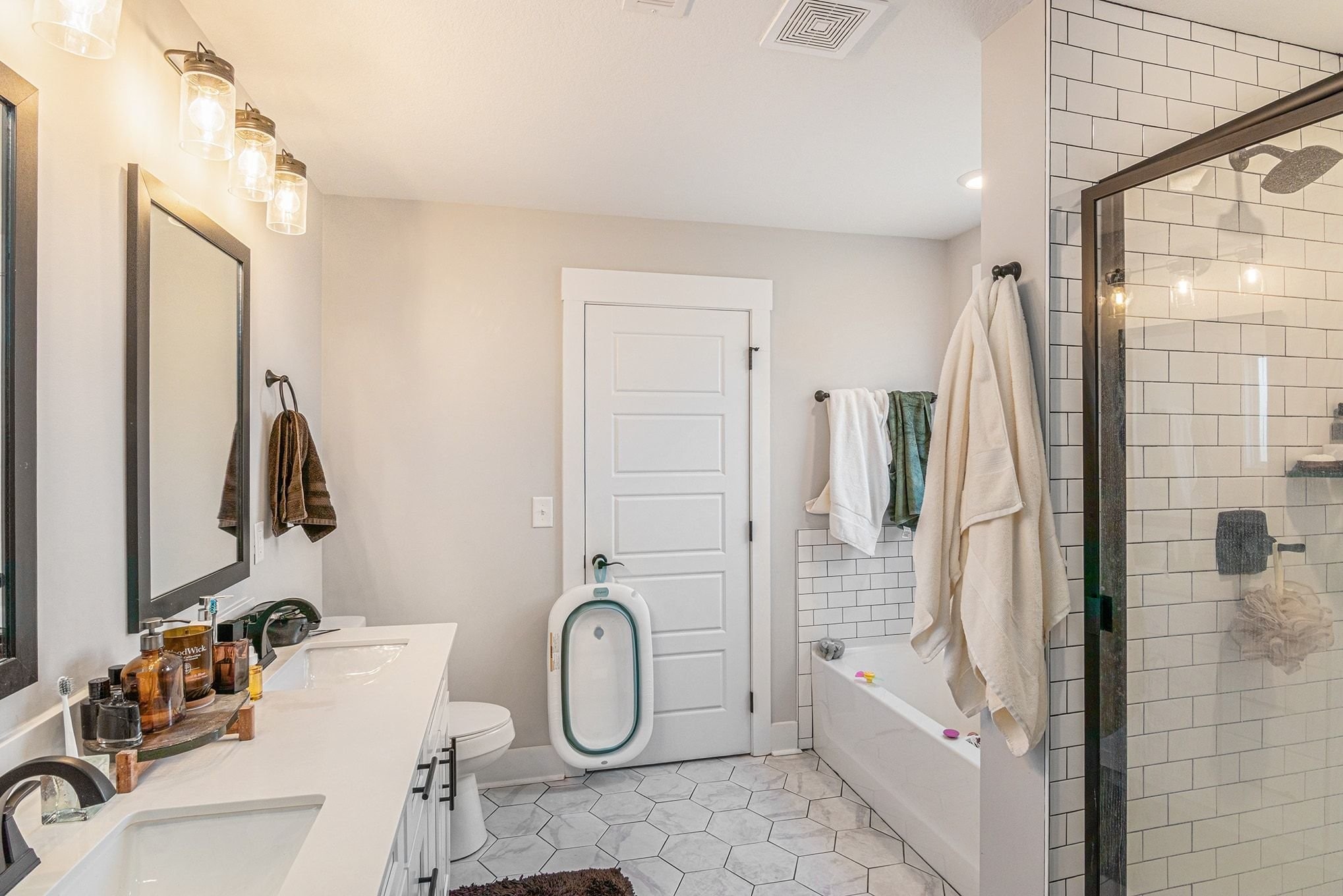 786 Limestone Way Clarksville, TN 37043 - Photo 17 of 29 a bathroom with a sink and a mirror