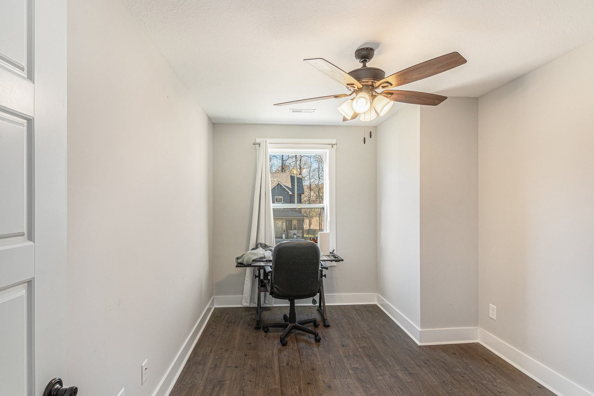 786 Limestone Way Clarksville, TN 37043 - Photo 22 of 29 a workspace with wooden floor and a window