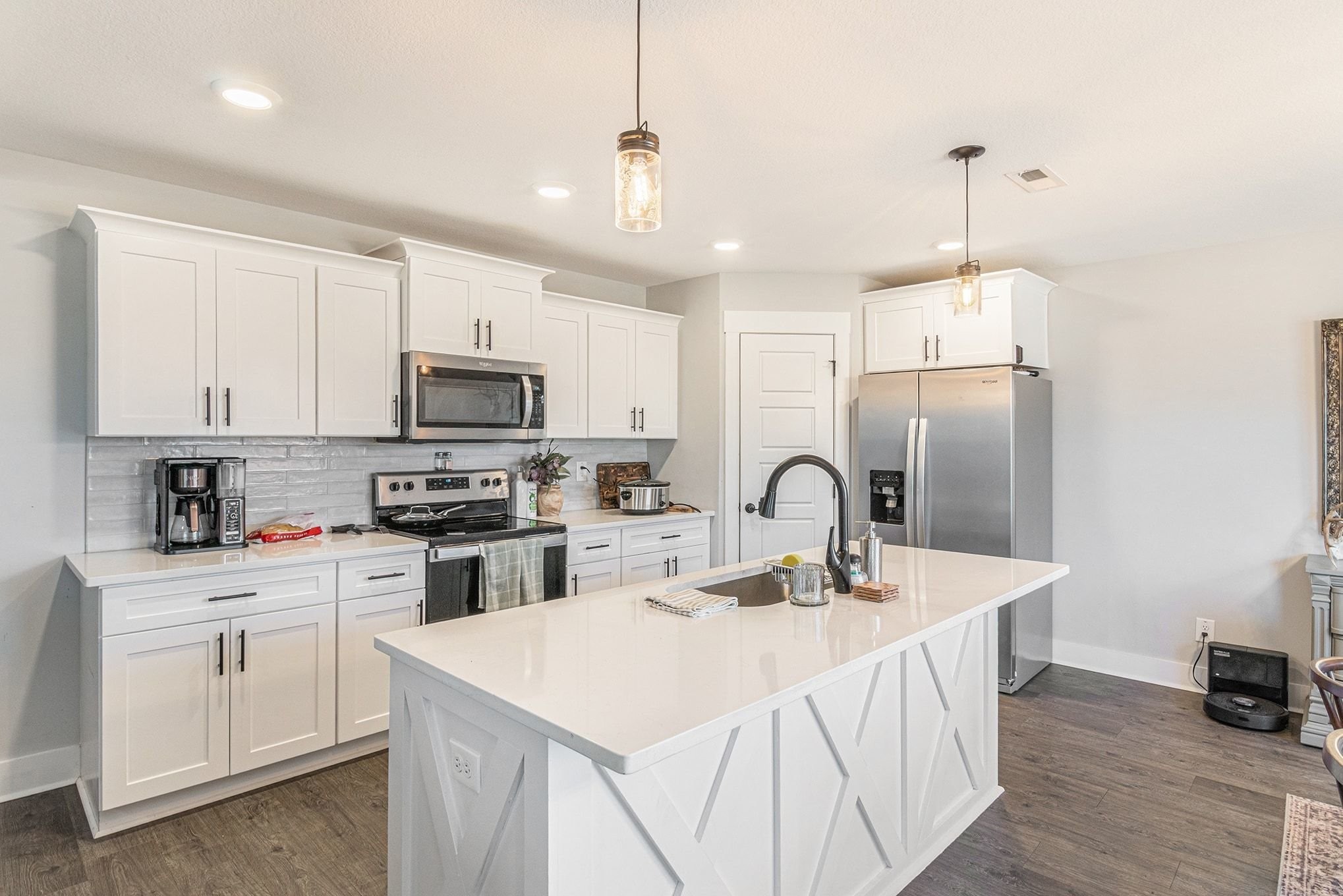 786 Limestone Way Clarksville, TN 37043 - Photo 9 of 29 a kitchen with kitchen island a sink stainless steel appliances and cabinets