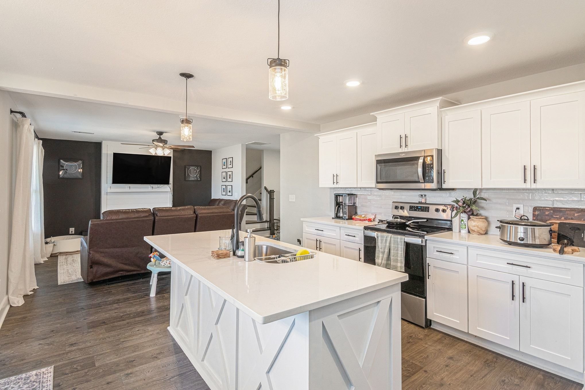 786 Limestone Way Clarksville, TN 37043 - Photo 10 of 29 a kitchen with sink a microwave and cabinets