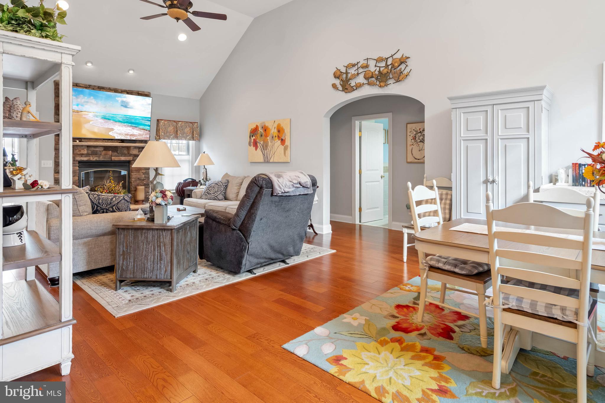 28344 River Road Seaford, DE 19973 - Photo 11 of 62 a living room with fireplace furniture and a wooden floor