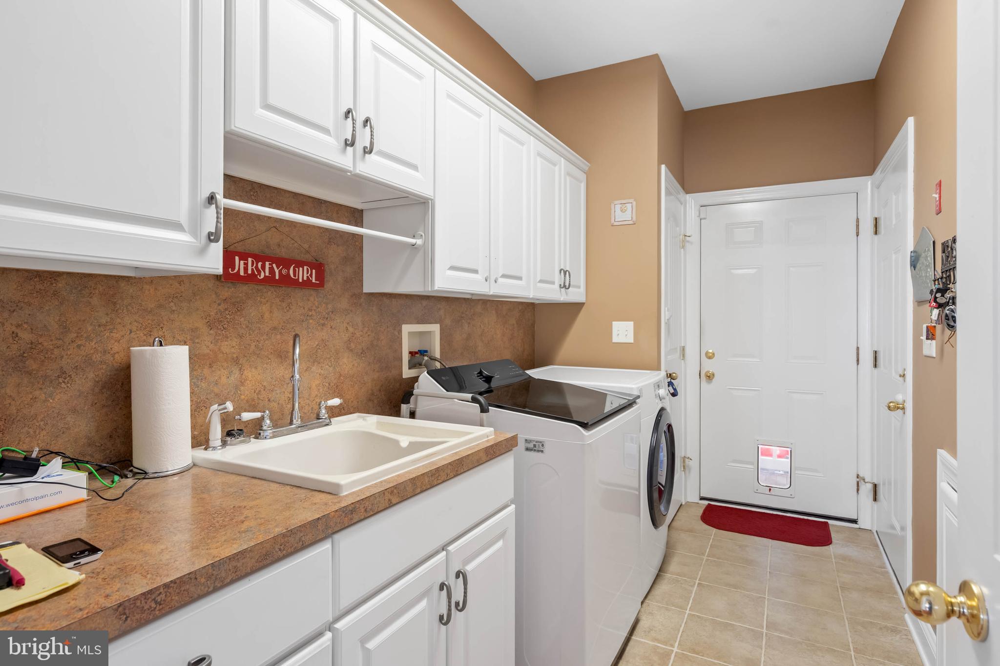 28344 River Road Seaford, DE 19973 - Photo 29 of 62 a room with a sink and cabinets