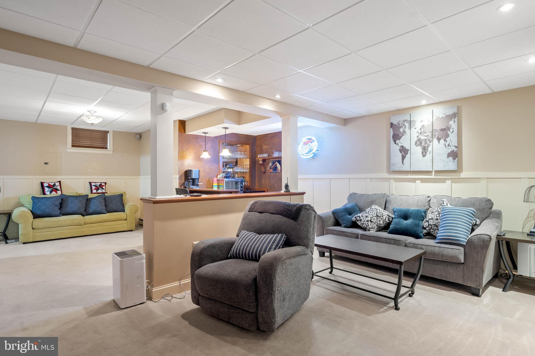 28344 River Road Seaford, DE 19973 - Photo 34 of 62 a living room with furniture and kitchen view