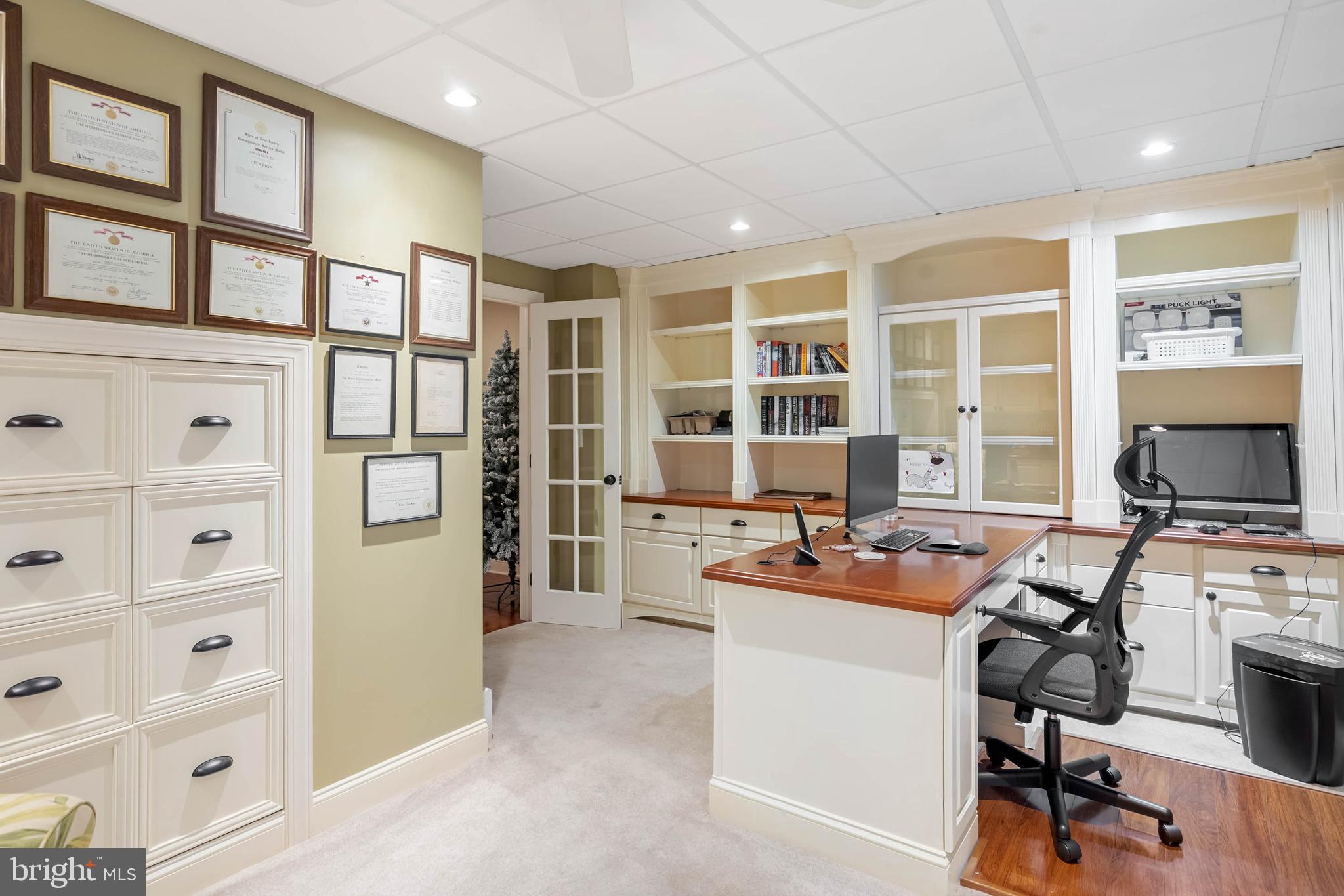 28344 River Road Seaford, DE 19973 - Photo 40 of 62 a room with furniture a flat screen tv and a floor to ceiling window