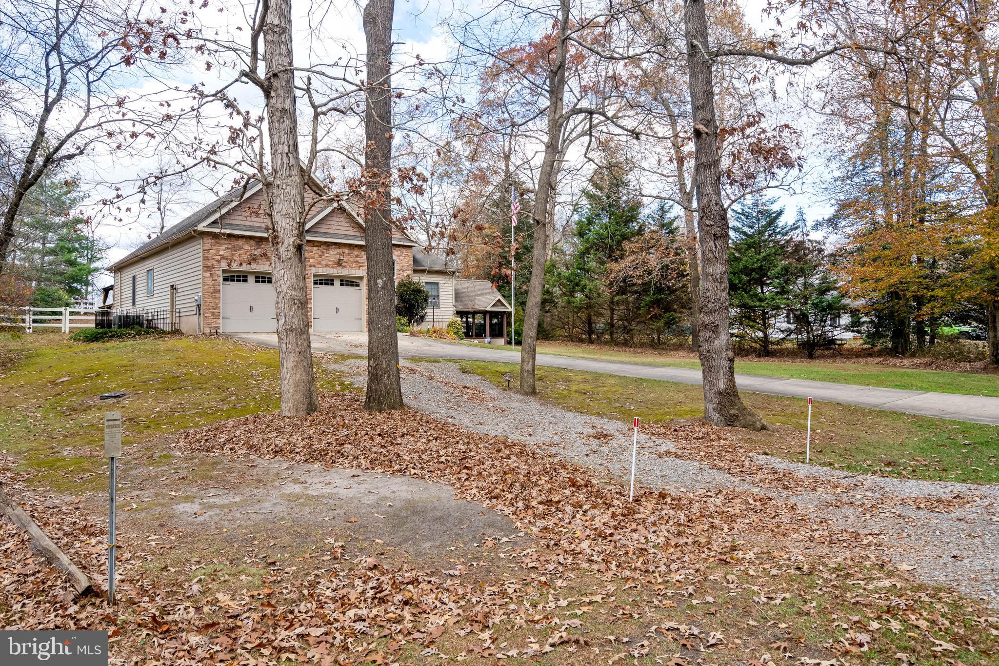 28344 River Road Seaford, DE 19973 - Photo 43 of 62 a view of a house with a yard