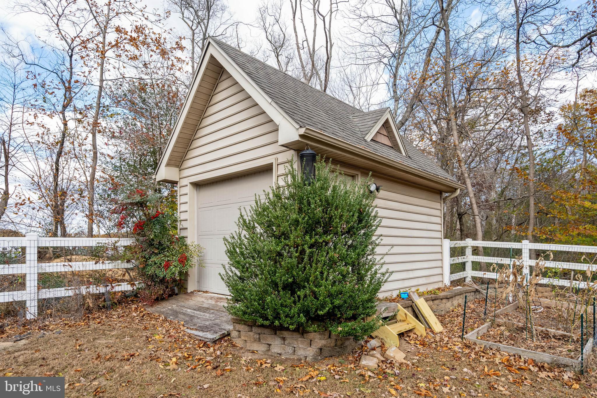 28344 River Road Seaford, DE 19973 - Photo 52 of 62 a view of a house with a yard and sitting area