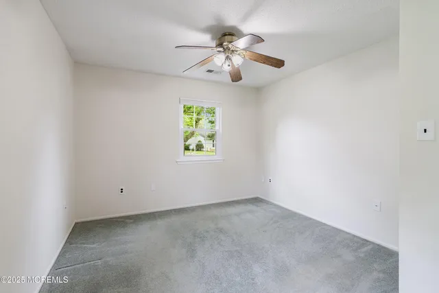 $310,000 | 23 Datchet Close, Unit 1000, Freehold, NJ 07728