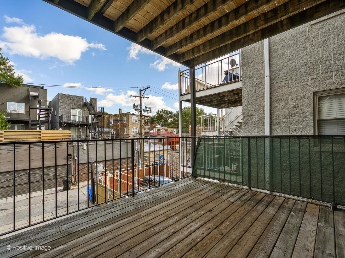 1533 North Campbell Avenue, Unit 2 Chicago, IL 60622 - Photo 14 of 14 a view of a balcony with wooden floor
