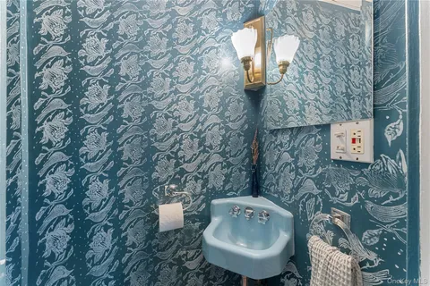 a bathroom with a toilet and sink