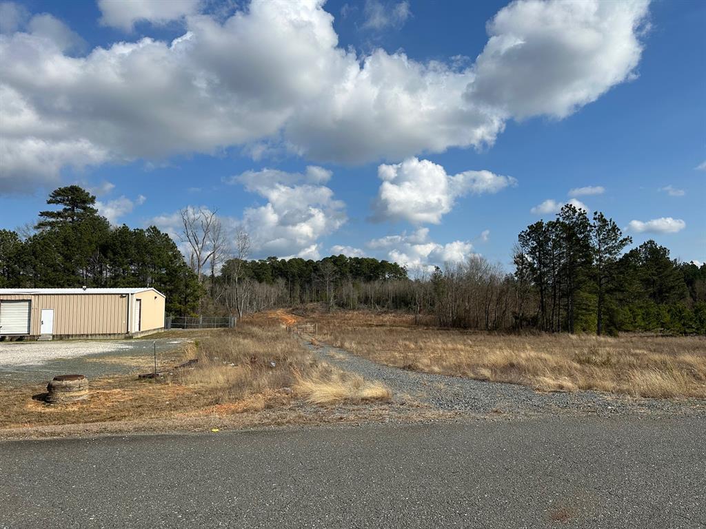 102 Ryan's Way Minden, LA 71055 - Photo 3 of 11 a view of a fountain in front of a house