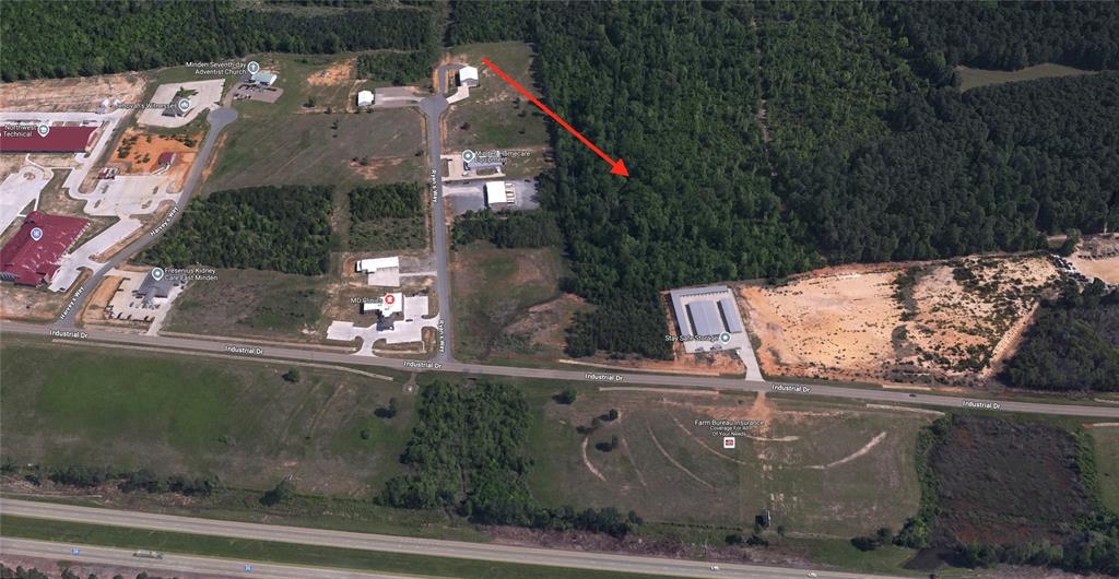 102 Ryan's Way Minden, LA 71055 - Photo 9 of 11 an aerial view of a house with a yard