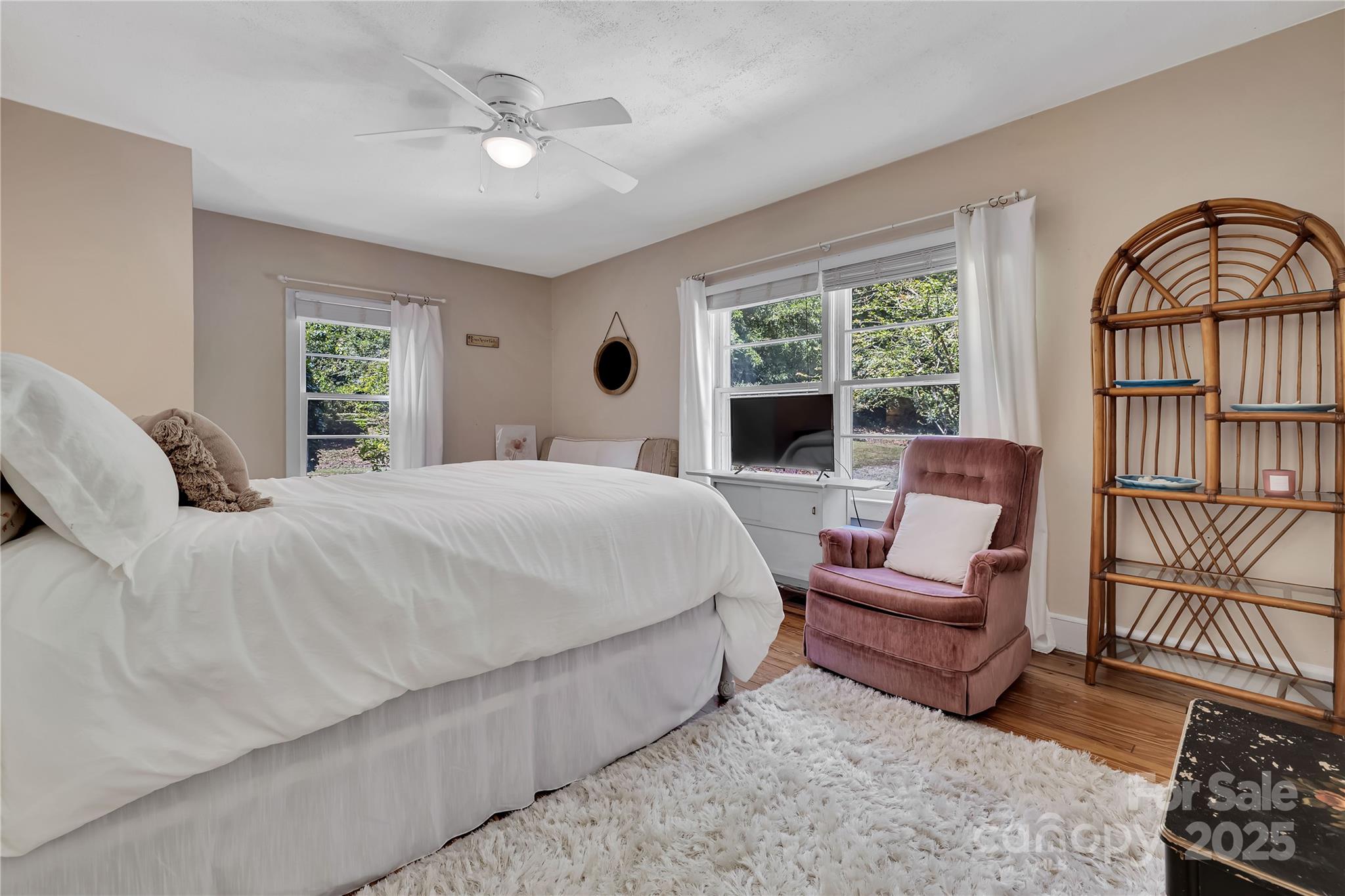 99 Warrior Mountain Road Tryon, NC 28782 - Photo 6 of 35 a bedroom with a bed a couch and dresser