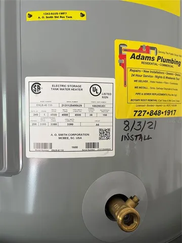 a kitchen with a cabinets and appliances