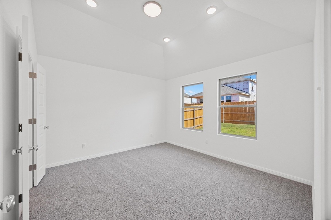 1251 Minorca Street Huffman, TX 77336 - Photo 10 of 24 an empty room with windows