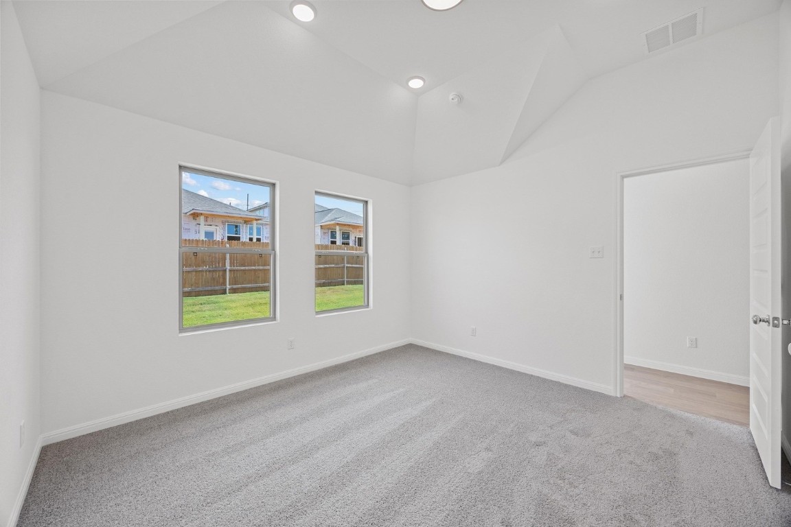 1251 Minorca Street Huffman, TX 77336 - Photo 11 of 24 an empty room with windows