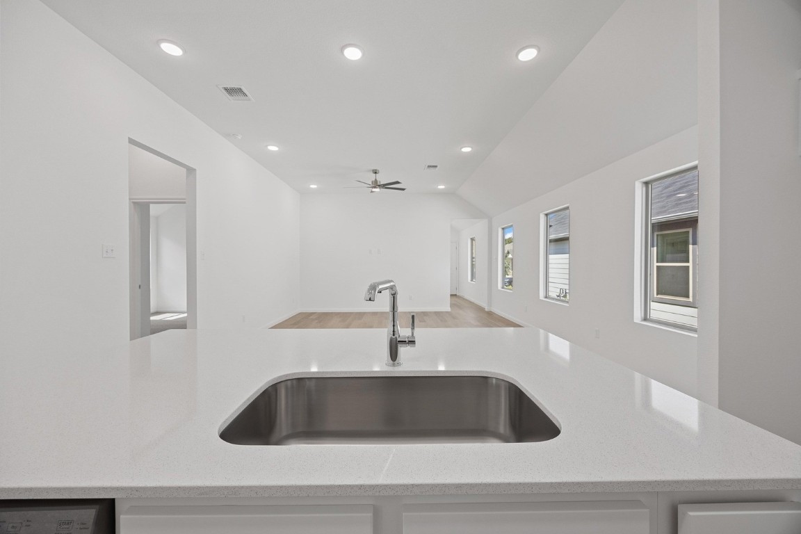 1251 Minorca Street Huffman, TX 77336 - Photo 7 of 24 a sink and a mirror