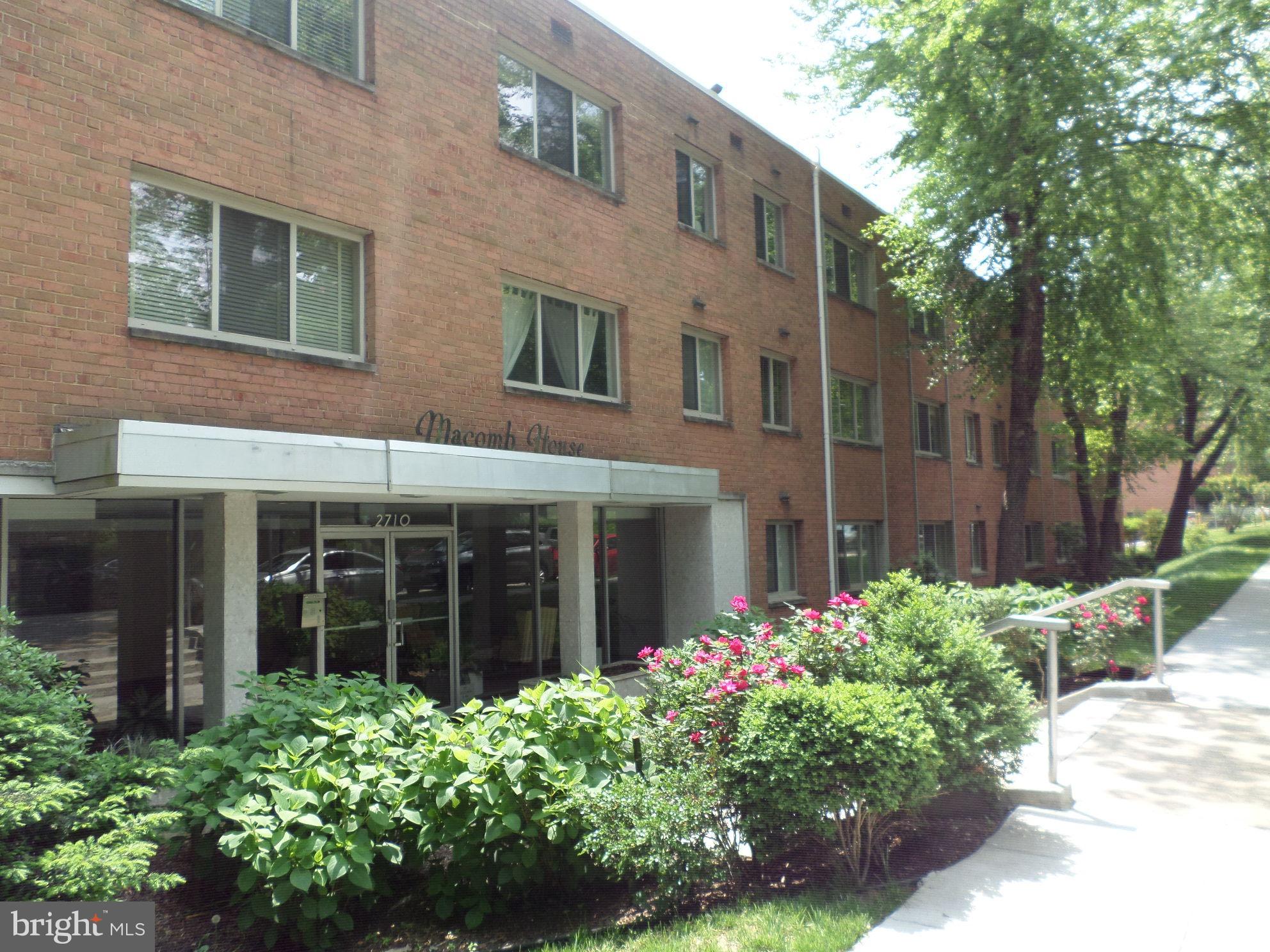 2710 Macomb Street Northwest, Unit 418 Washington, DC 20008 - Photo 3 of 21 Side and stree view of building