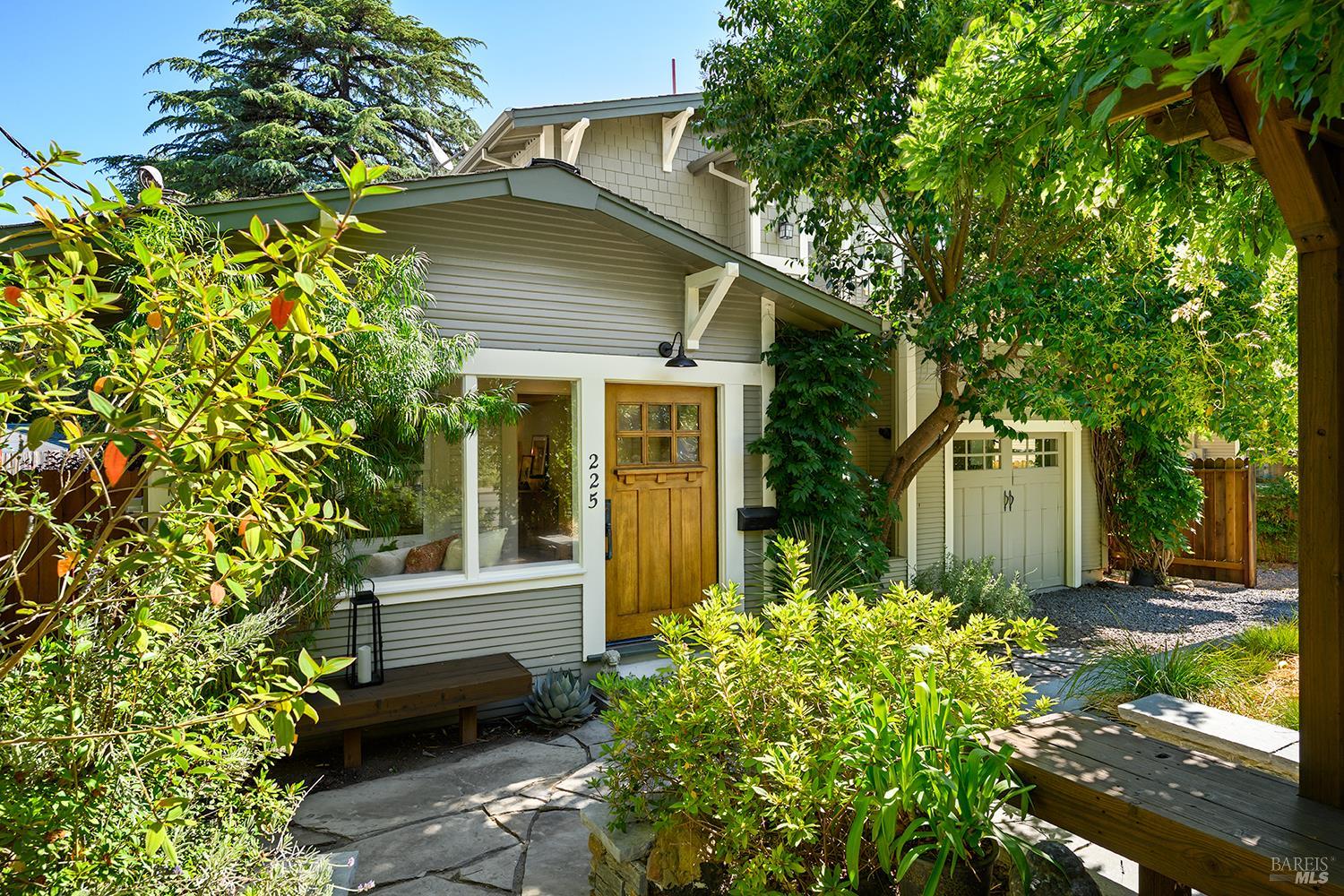 225 Dutton Avenue Sebastopol, CA 95472 - Photo 1 of 1 a front view of a house with a garden