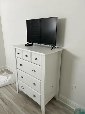 a view of workspace with cabinet