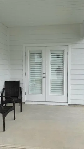 a view of livingroom with furniture and a window