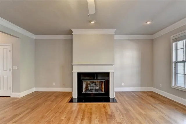 a view of a kitchen with a sink and a window