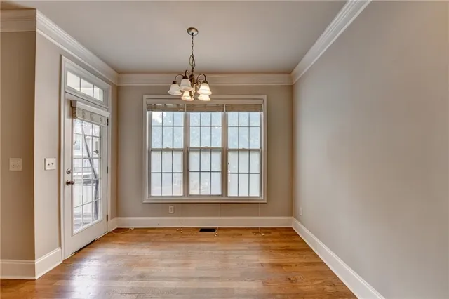 a kitchen with stainless steel appliances granite countertop a refrigerator sink and cabinets