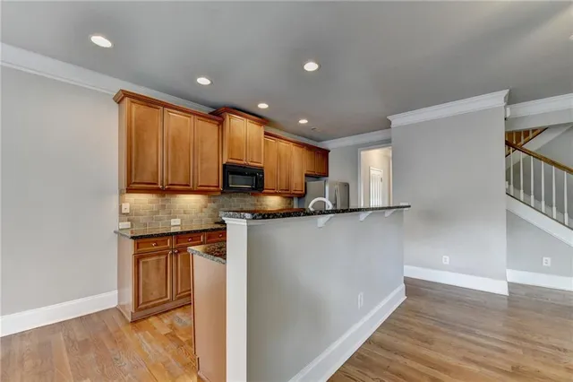 a view of an empty room with a windows