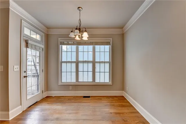 a bathroom with a tub double sink and a mirror