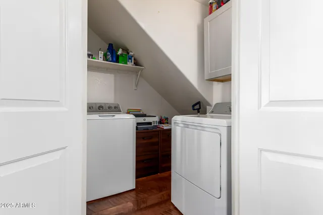 a utility room with dryer and washer