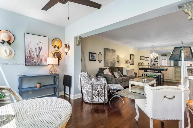 a living room with furniture and a table
