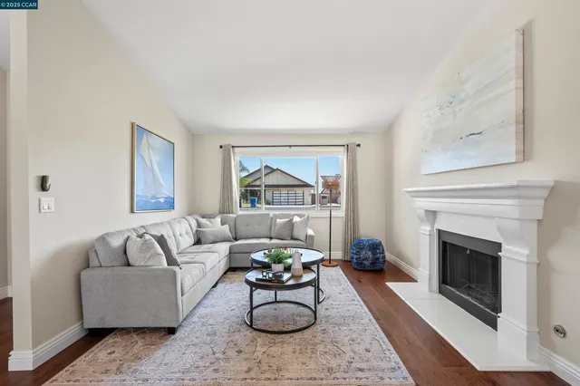 a spacious bedroom with a bed and lamp