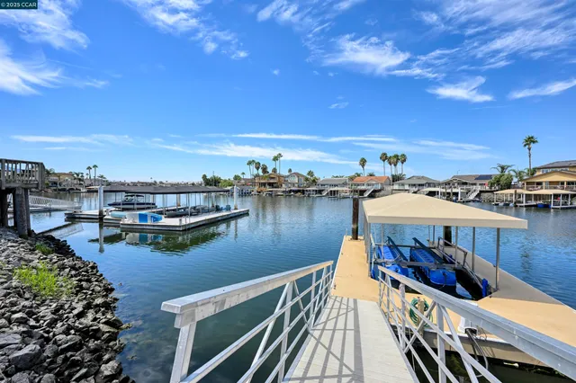 a view of a lake with a car parked
