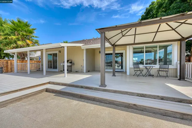 a view of a lake with boats and trees