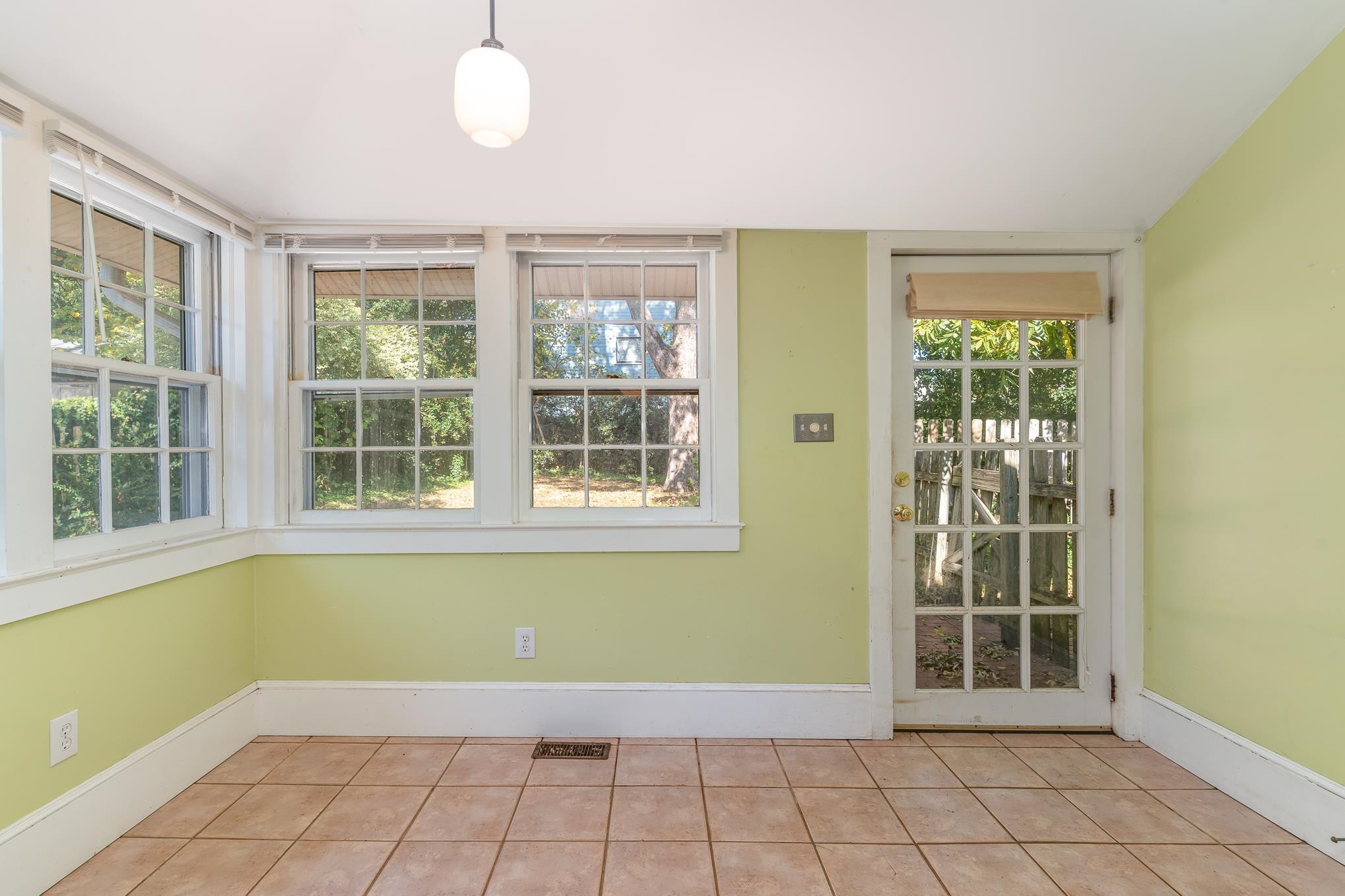 519 Holden Street Raleigh, NC 27604 - Photo 11 of 23 a view of an empty room with windows