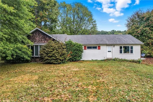 a house view with a garden space