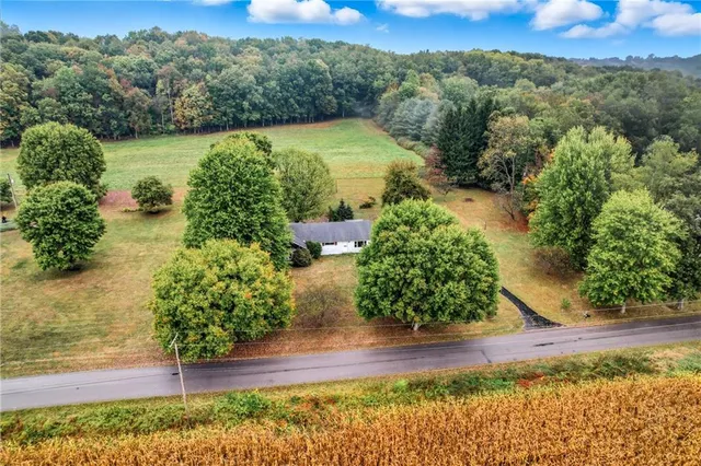 a view of a lake with a yard